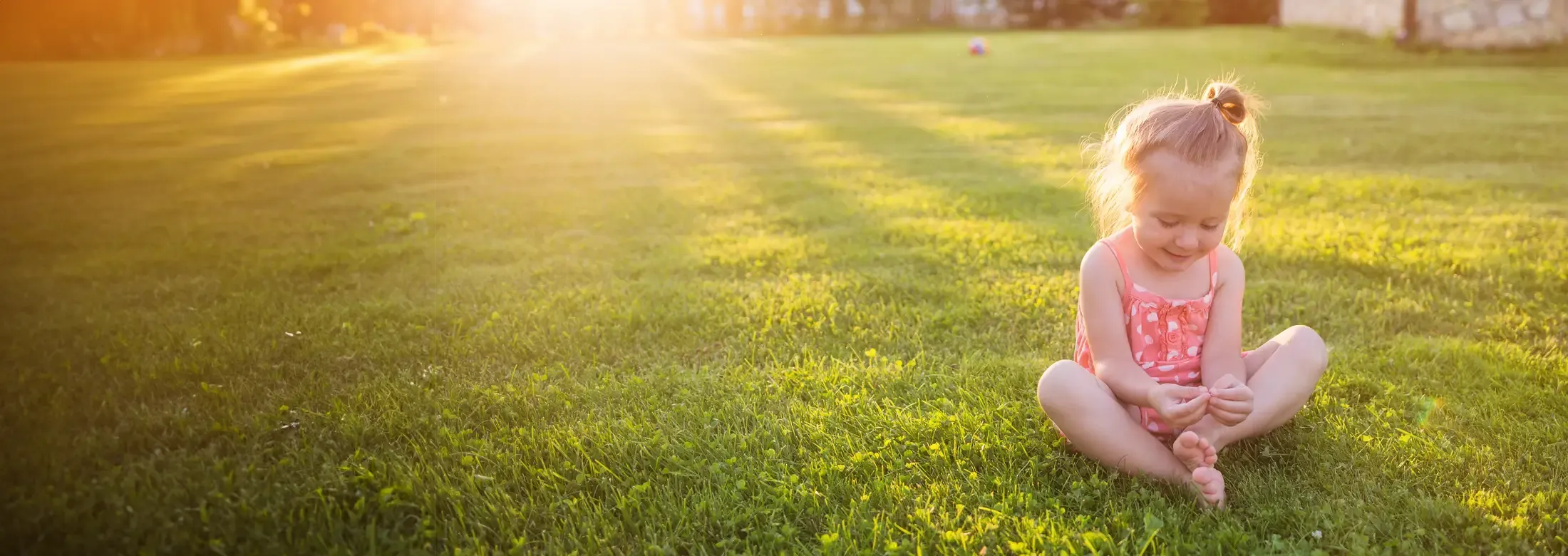 girl sitting on grass